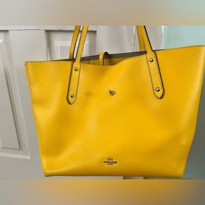 COACH yellow leather bag.
